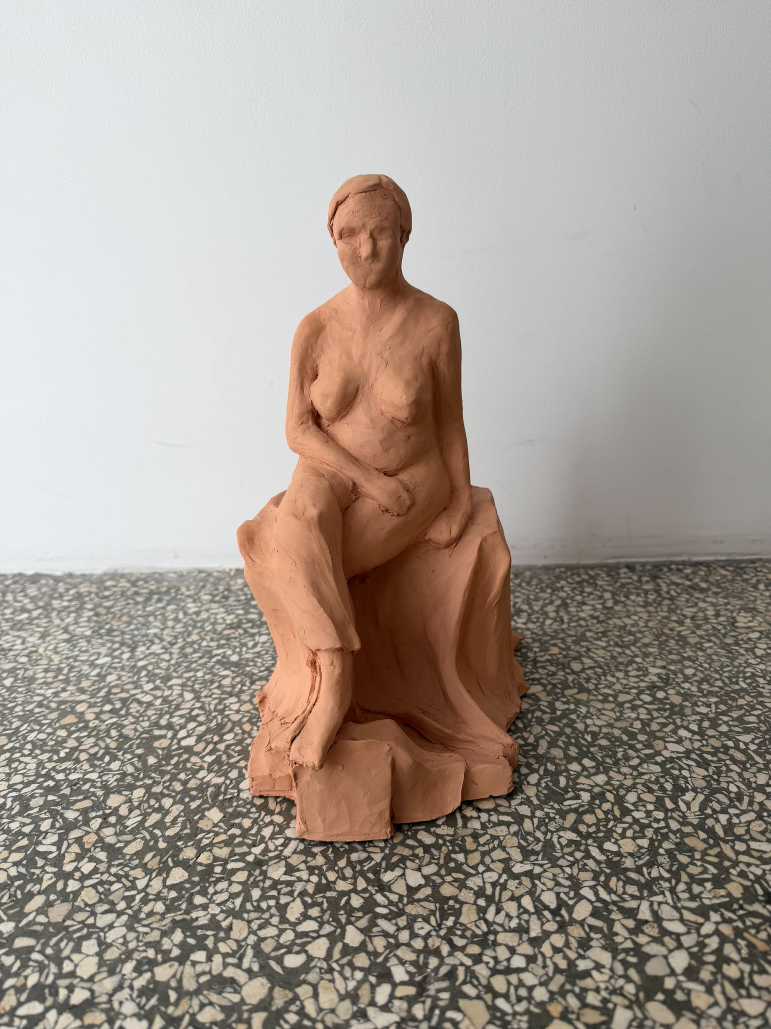 THE SITTING LADY...