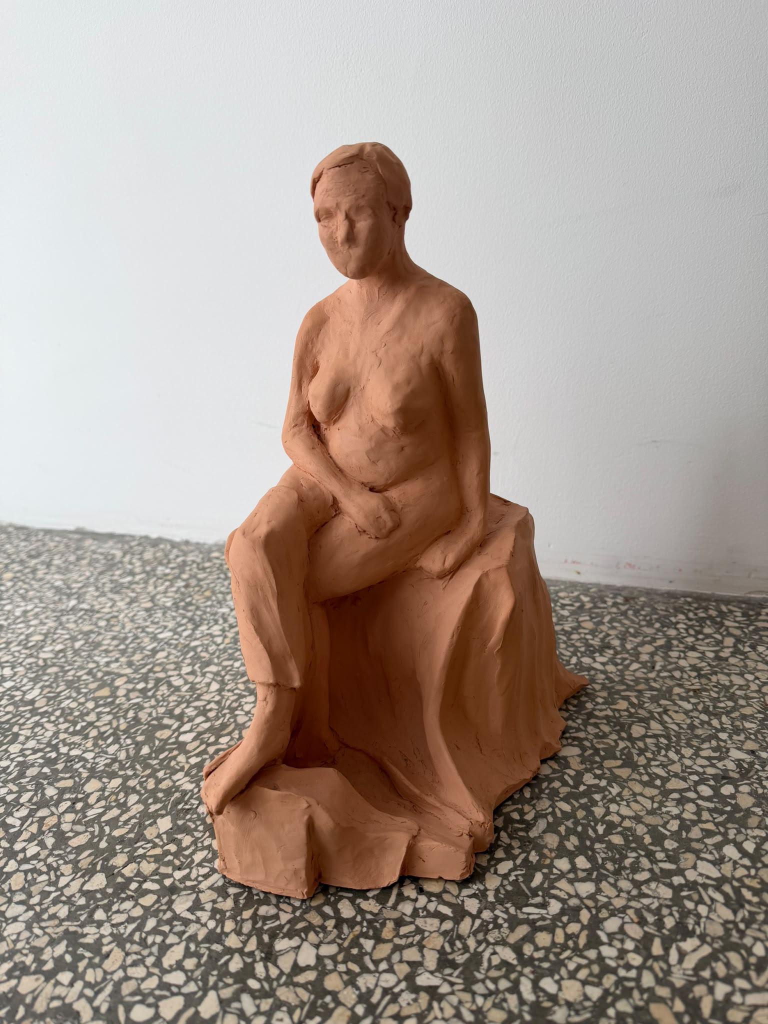 THE SITTING LADY...